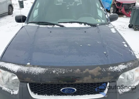 2001 Ford Escape Xlt z USA, uszkodzony, nr VIN 1FMYU041X1KC58554